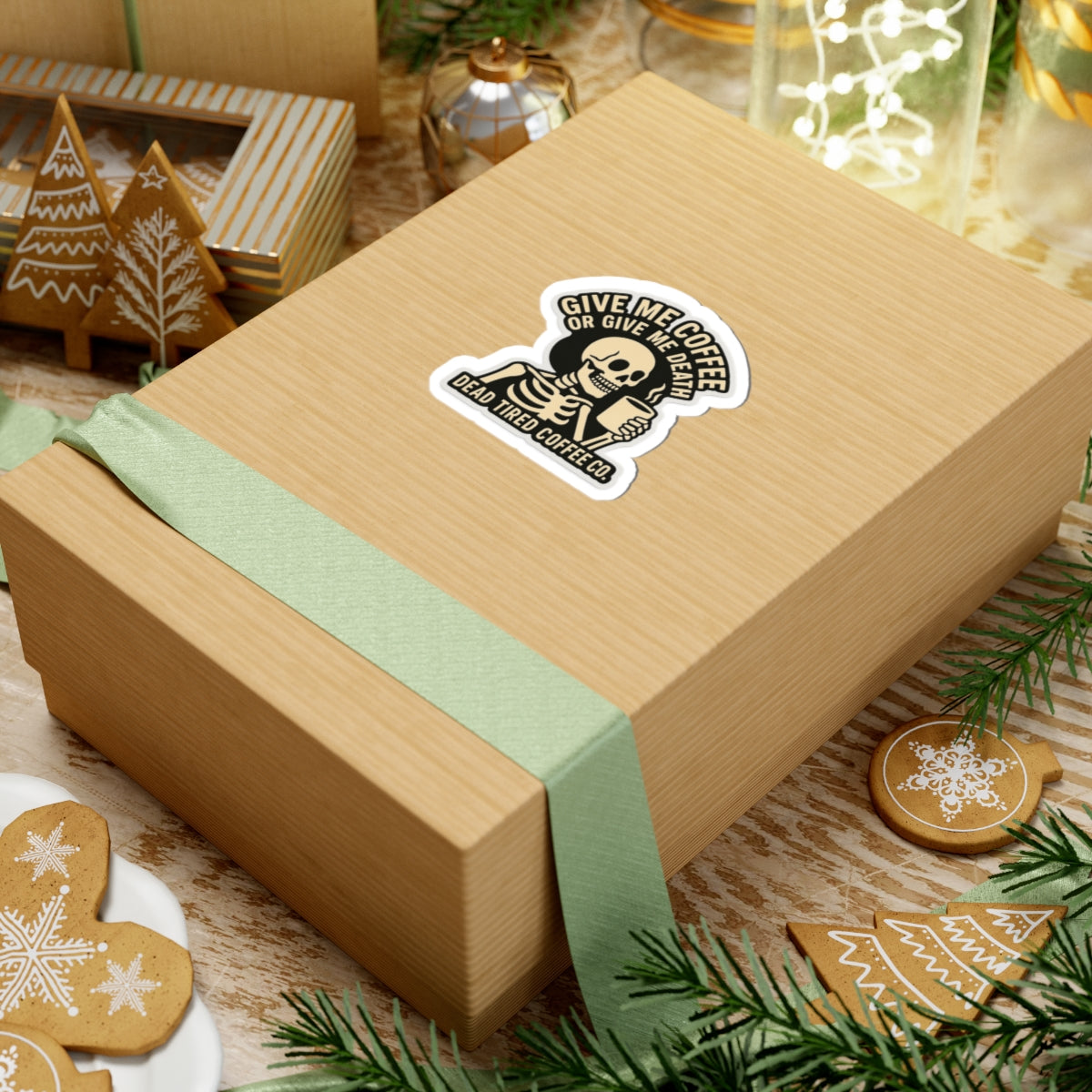 Wooden gift box with a skeleton label on a festive background with cookies and greenery