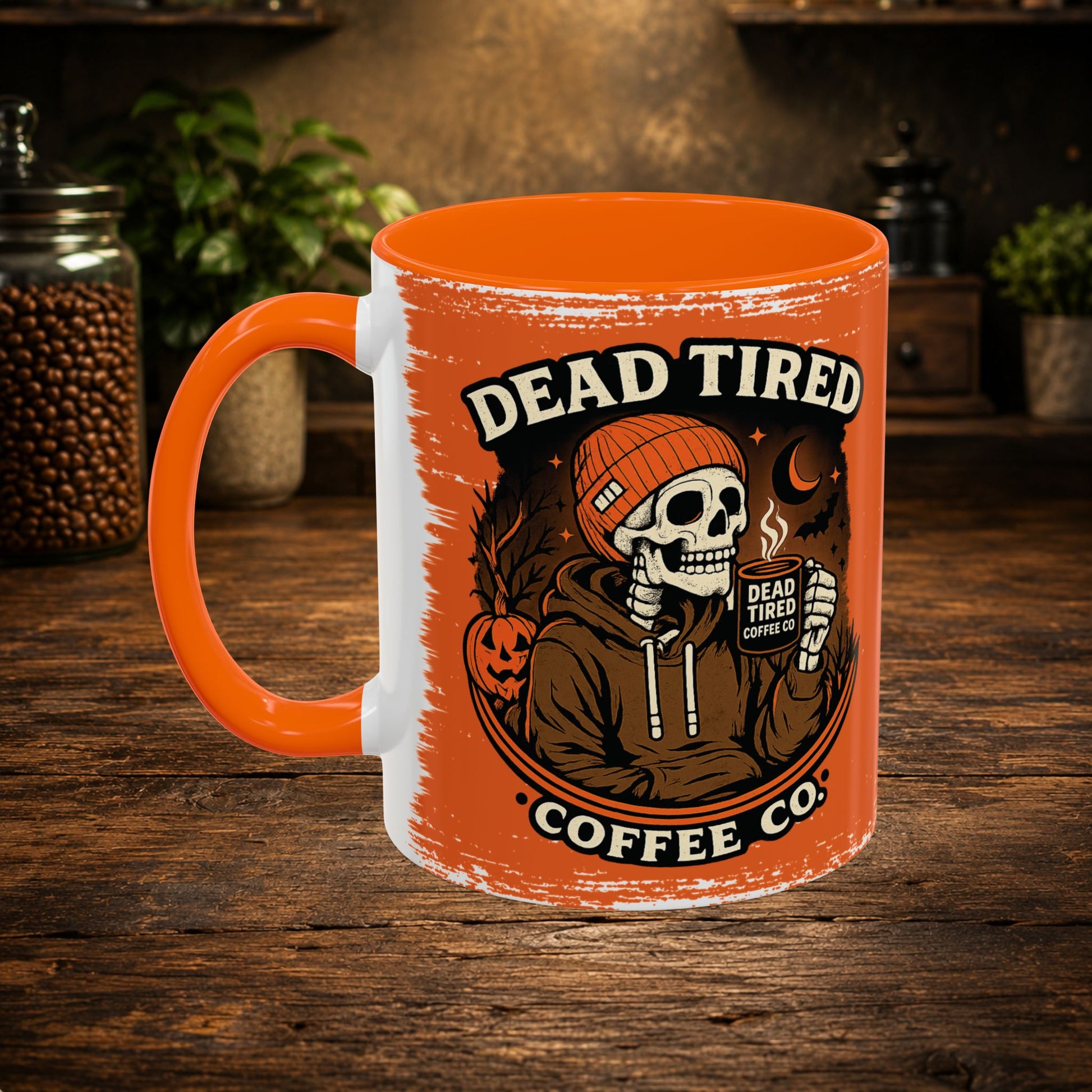 Close-up of bundled skeleton enjoying coffee on orange accent mug