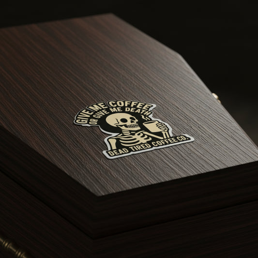 Sticker with skeleton holding a coffee cup and text 'Give Me Coffee or Give Me Death' on a white background.