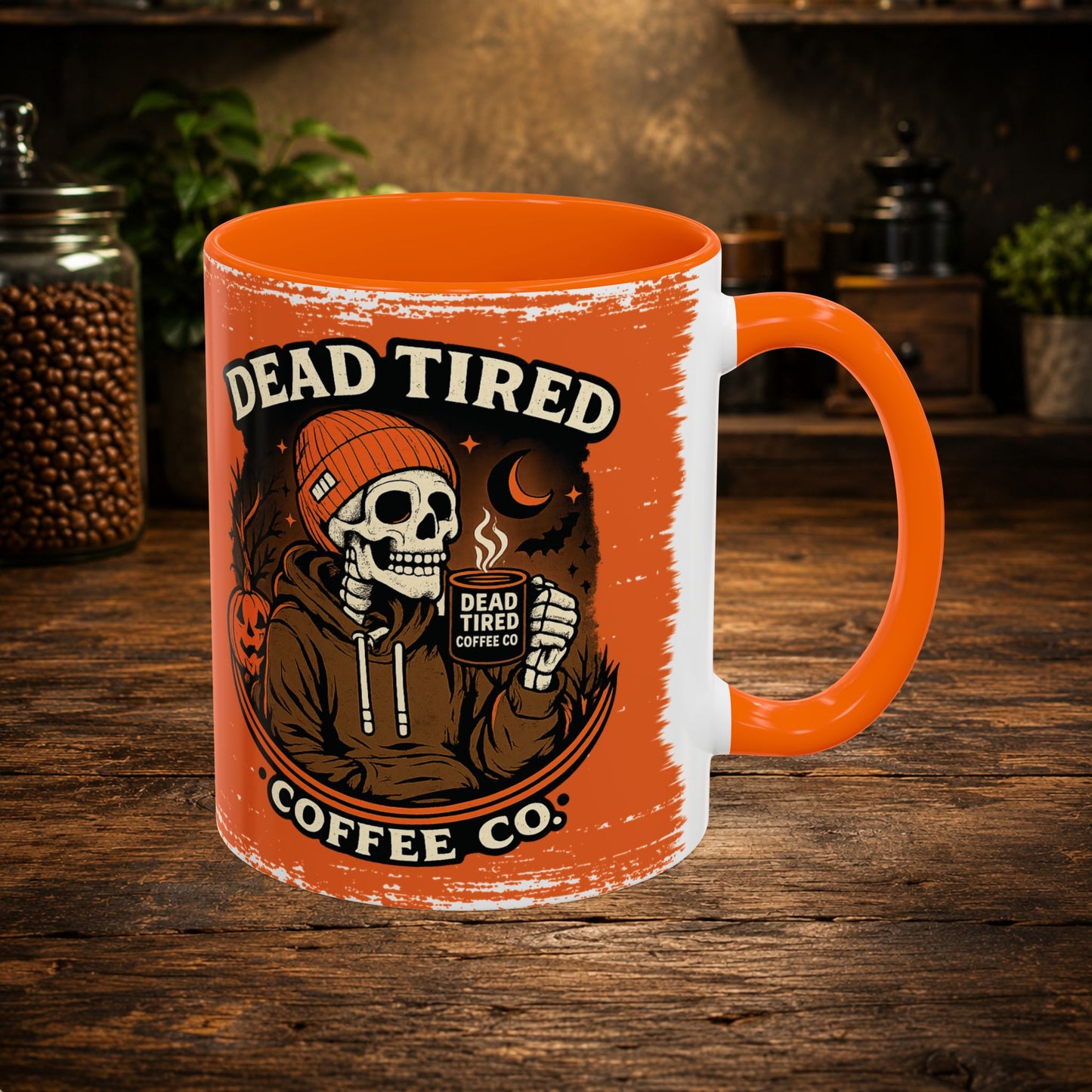 Side view of orange ceramic accent mug with Dead Tired Coffee Co. design