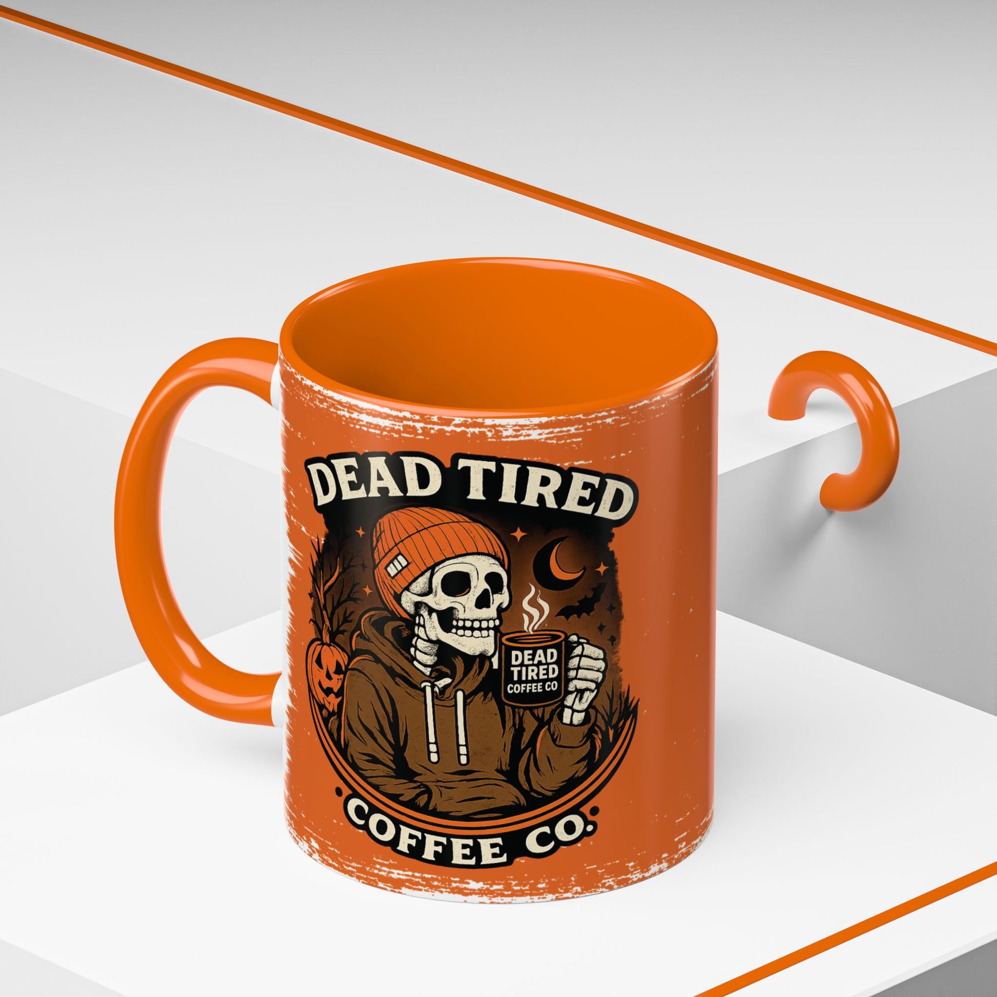 Dead Tired Skeleton Orange Accent Mug displayed with cozy fall styling