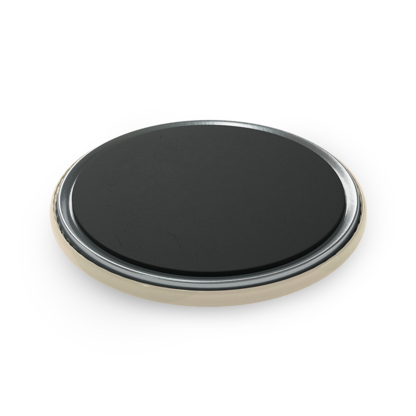 Round black object with gold rim on a white background