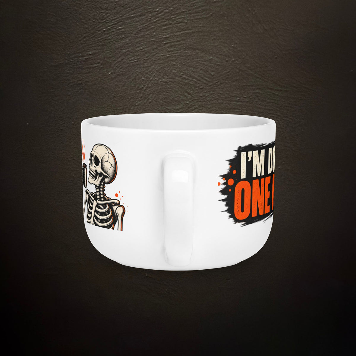 Reverse view of the 25 oz Dead Tired Coffee Co. mug with skeleton coffee artwork and DTCC logo.