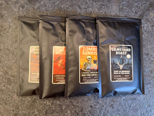 Four Dead Tired Coffee Co. 2 oz samples: Pumpkin Hollow, Maple Mourning, Zombie Sunrise, and Graveyard Roast