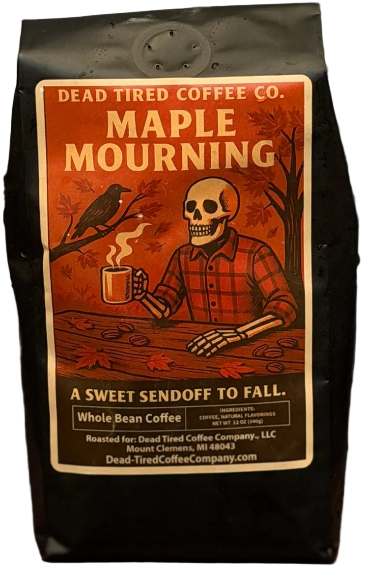 Maple Mourning maple pecan coffee bag by Dead Tired Coffee Co. The autumn label shows a plaid-shirted skeleton with a steaming mug, a crow, and falling leaves.